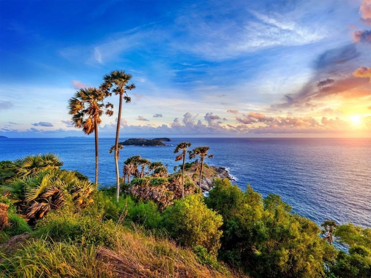 Why are the rocks at Phuket's southernmost tip covered in elephant sculptures?