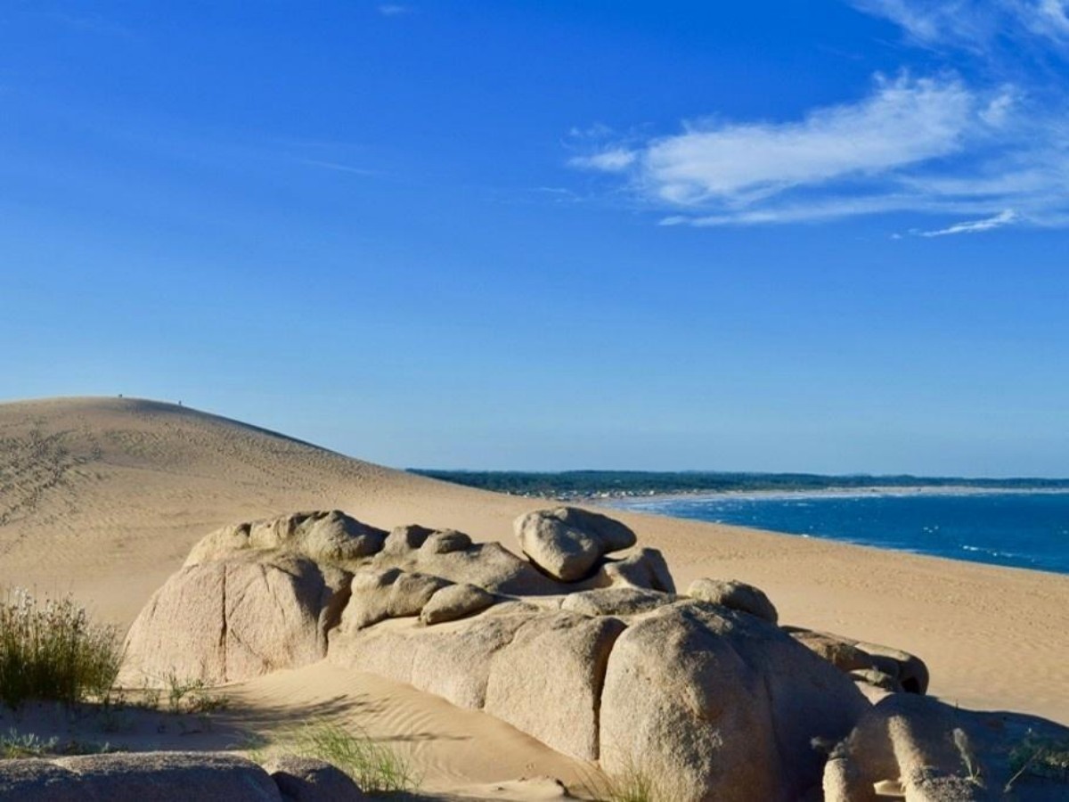 How to experience the fun of running and sandboarding on the dunes in Barra de Valizas!