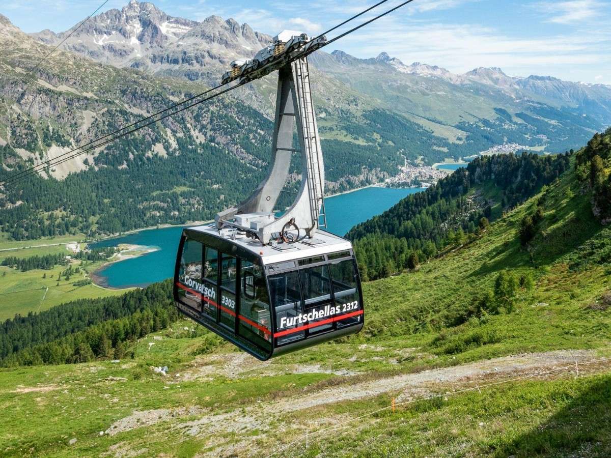 St. Moritz Cable Car: Watch the snow-capped mountains and lakes from the air and feel the shock of nature