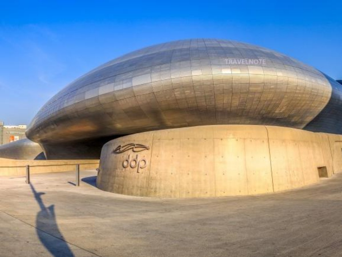 Daytime: Surrealist architectural wonder, modern cultural sanctuary