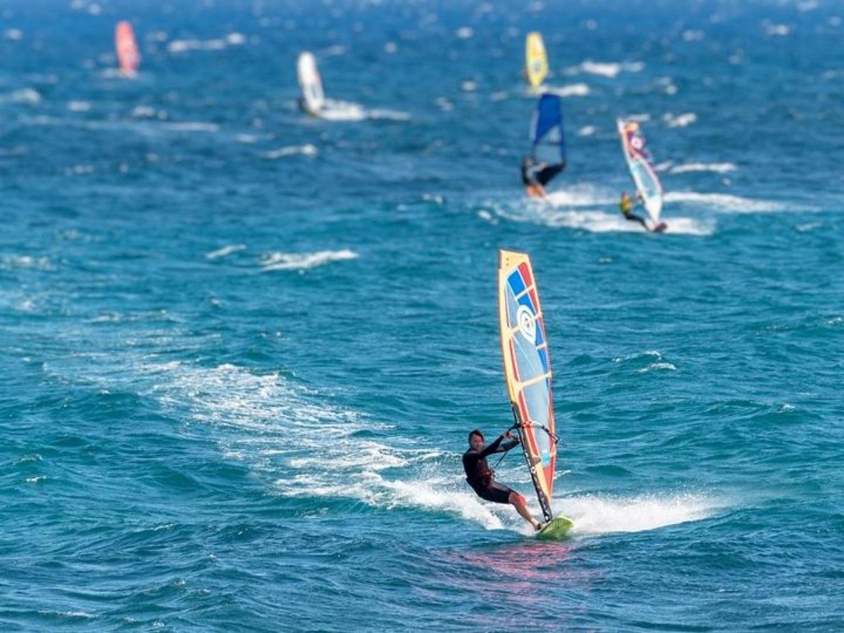 Ride the wind and waves and enjoy the ultimate pleasure of windsurfing